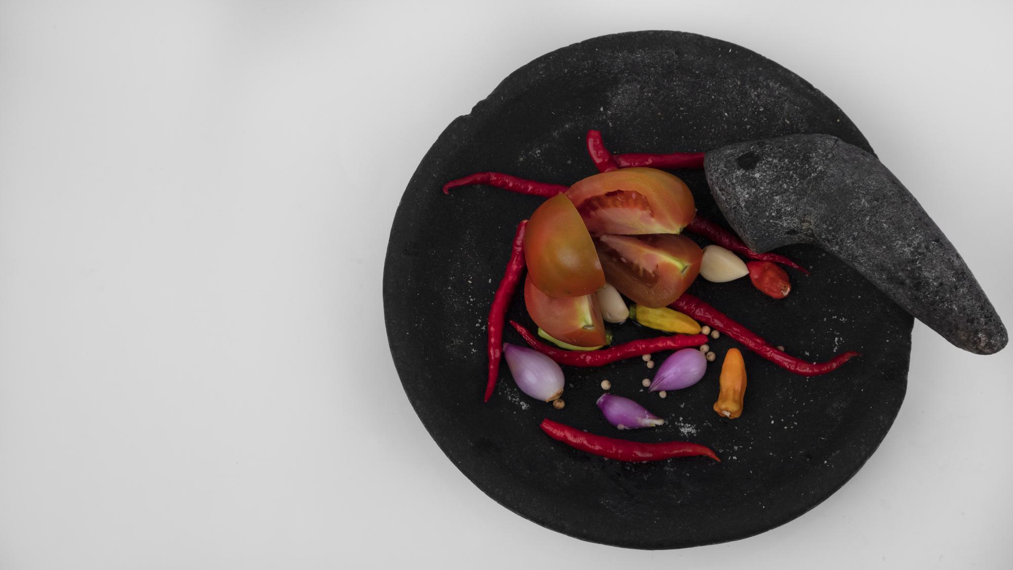 Close-up of charred vegetables plated