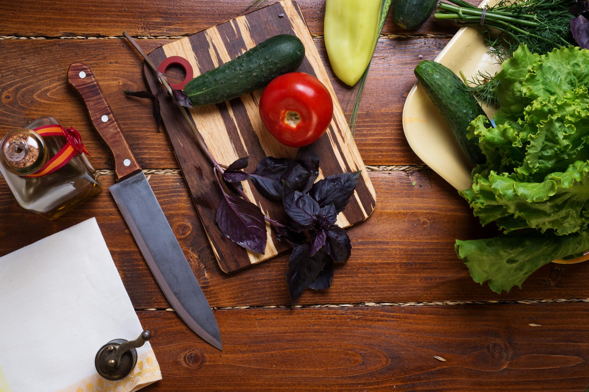 Workshop table with knives and herbs
